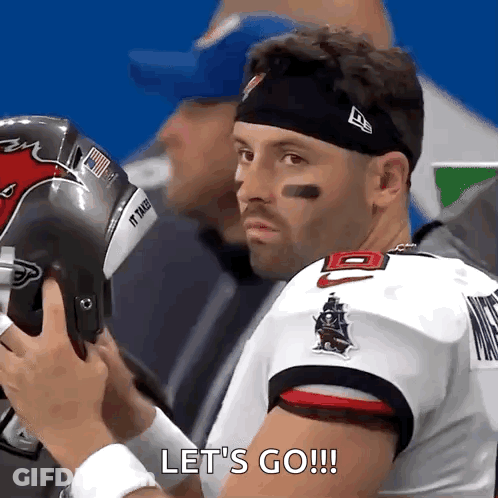 Football Player Saying Let's Go Putting On Helmet GIF