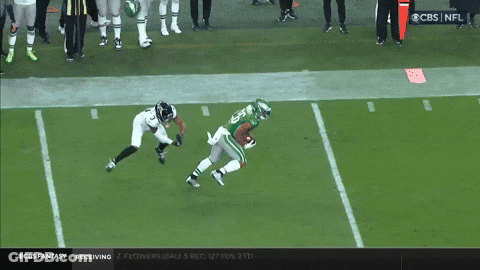 Football Player Screaming In Front Of Group GIF