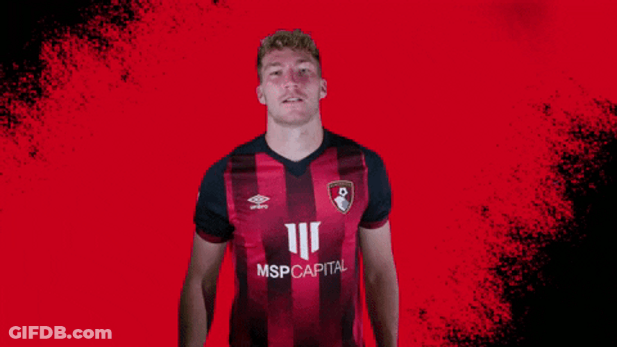 Football Player Shrugs GIF