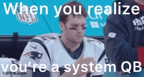 Football Player Sitting In Dugout Looking At Phone GIF