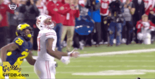 Football Player Tackled By Yellow Uniform GIF