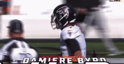 Football Player Talking To Referee GIF