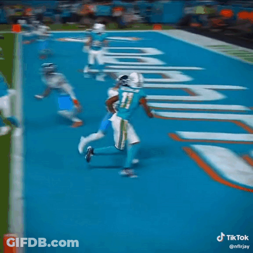 Football Player Trying To Catch Pass GIF