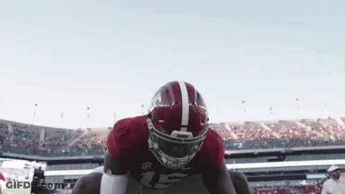 Football Player Wearing Alabama Helmet GIF