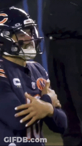 Football Player Wearing Helmet And Number 10 Jersey GIF