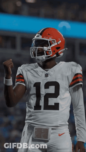 Football Player Wearing Helmet And Number 12 Jersey GIF