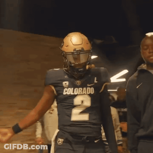 Football Player Wearing Helmet And Number 2 Jersey GIF