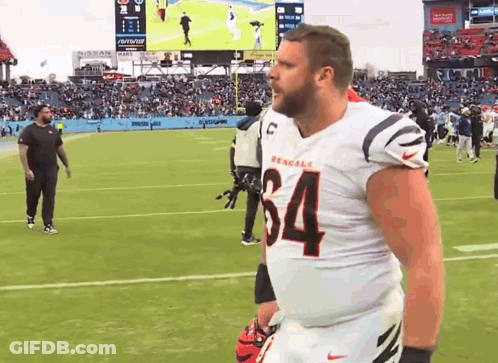 Football Player Wearing Helmet Number 10 GIF