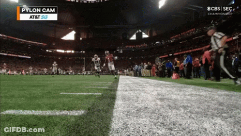 Football Player Wearing Helmet Number 18 GIF