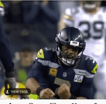 Football Player Wearing Helmet Number 39 GIF
