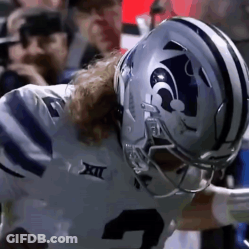 Football Player Wearing Helmet That Says XII GIF