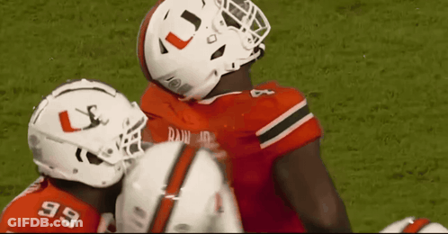 Football Player Wearing Helmet With L GIF