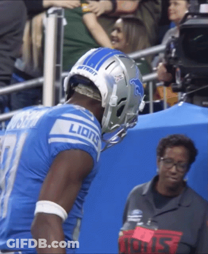 Football Player Wearing Lions Helmet GIF