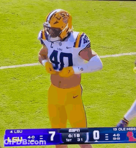 Football Player Wearing LSU Helmet GIF