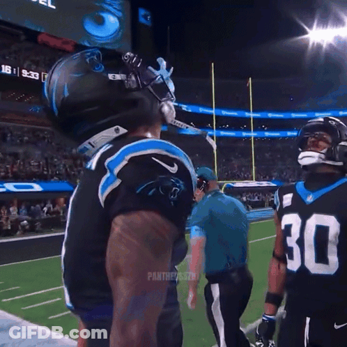 Football Player Wearing Mask With Number 4 GIF