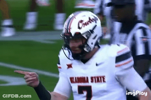 Football Player Wearing Oklahoma State Helmet GIF