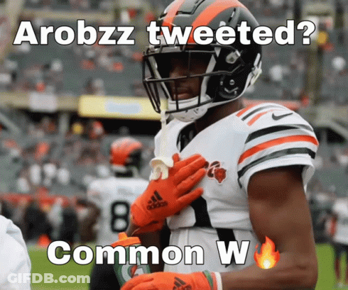 Football Player Wearing Orange Gloves GIF