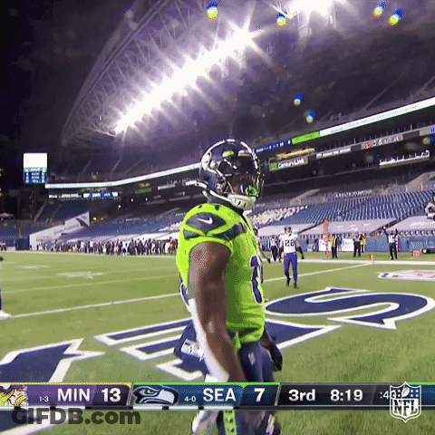 Football Player Wearing Santa Hat Number 41 GIF