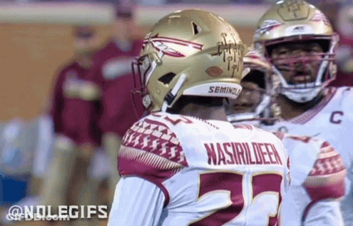 Football Player Wearing Seminole Helmet GIF