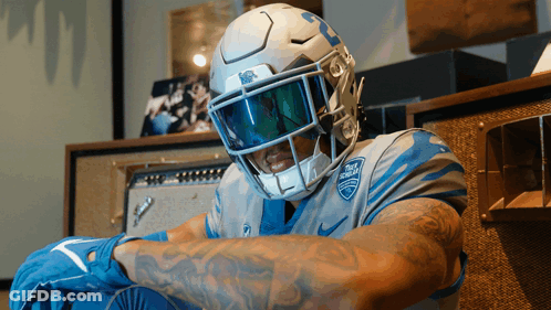 Football Player Wearing UCSD Helmet GIF