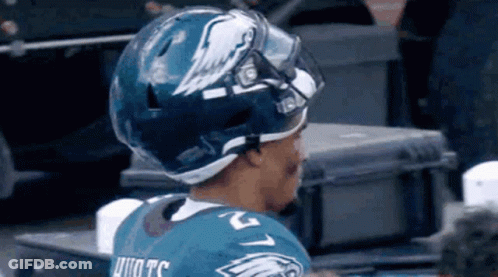 Football Player With Bird On Helmet GIF