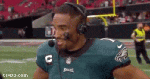Football Player With Headphones And Headset Talking GIF