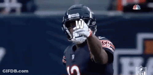 Football Player With Helmet And Letter W On Hand GIF