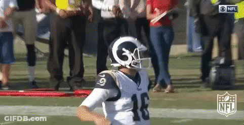 Football Player With Helmet Number 18 GIF