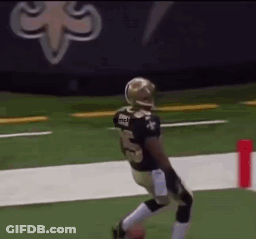 Football Player With Helmet Running Down Field GIF