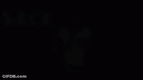 Football Player With Sack On Front GIF