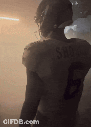 Football Player With Shone On Shirt GIF