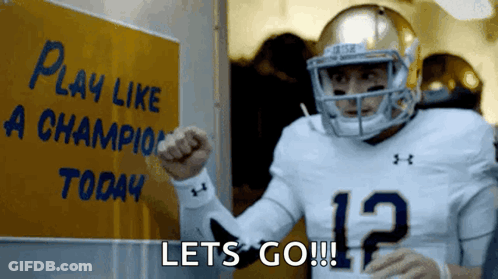 Football Player With Sign Play Like A Champion Today GIF