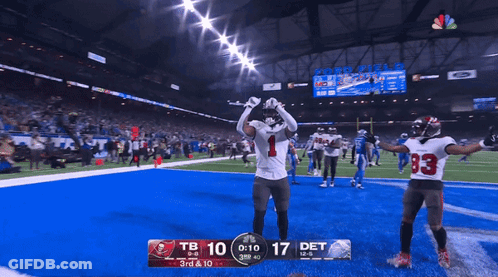 Football Players Celebrating Touchdown GIF