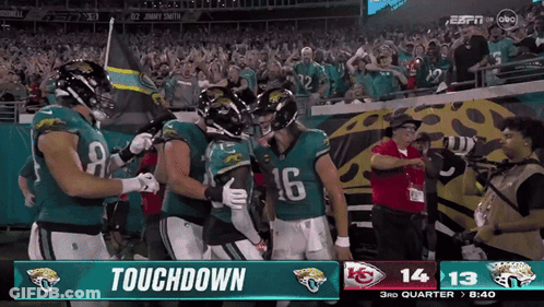 Football Players Celebrating Touchdown GIF