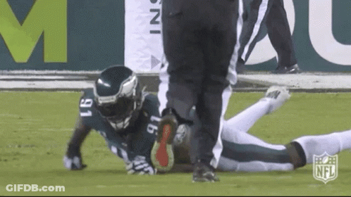 Football Players Celebrating Touchdown GIF