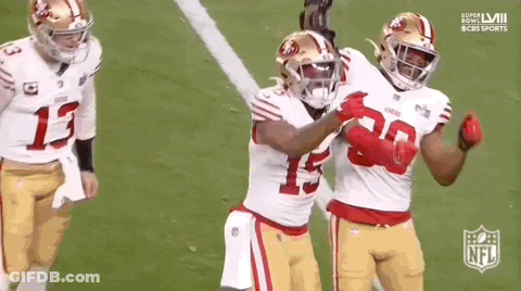 Football Players Celebrating Touchdown GIF
