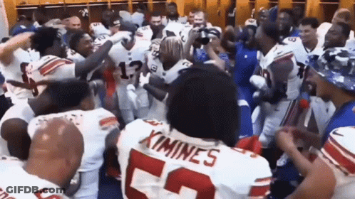 Football Players Dancing In Locker Room Number 25 GIF