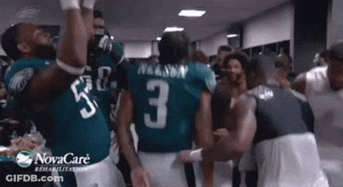Football Players Dancing In Locker Room Sponsored By Novacare GIF