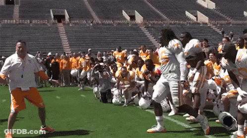 Football Players Dancing On Field GIF