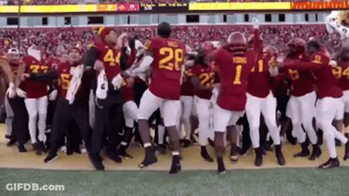 Football Players Dancing With Number 1 Jersey GIF