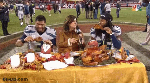 Football Players Eating Turkey GIF