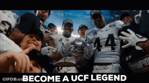 Football Players Holding Trophy Become A UCF Legend GIF