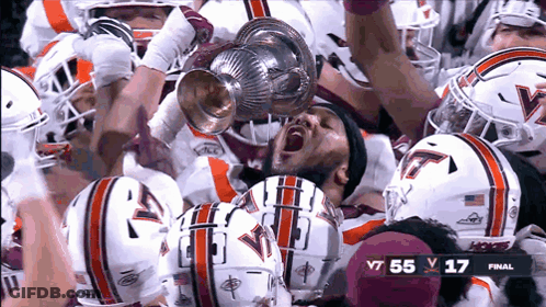 Football Players Holding Trophy Score 17-55 GIF