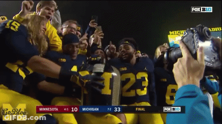 Football Players Holding Trophy With Number 23 GIF