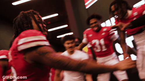 Football Players Huddled Number 31 GIF