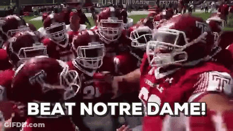 Football Players Huddled Saying Beat Notre Dame GIF
