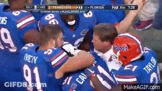 Football Players Hugging GIF