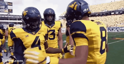 Football Players Hugging Number 4 GIF
