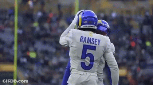 Football Players Hugging On Field GIF