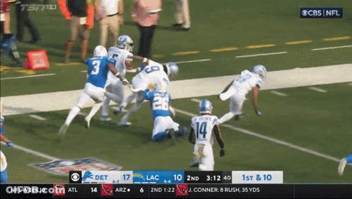Football Players Hugging On Field GIF